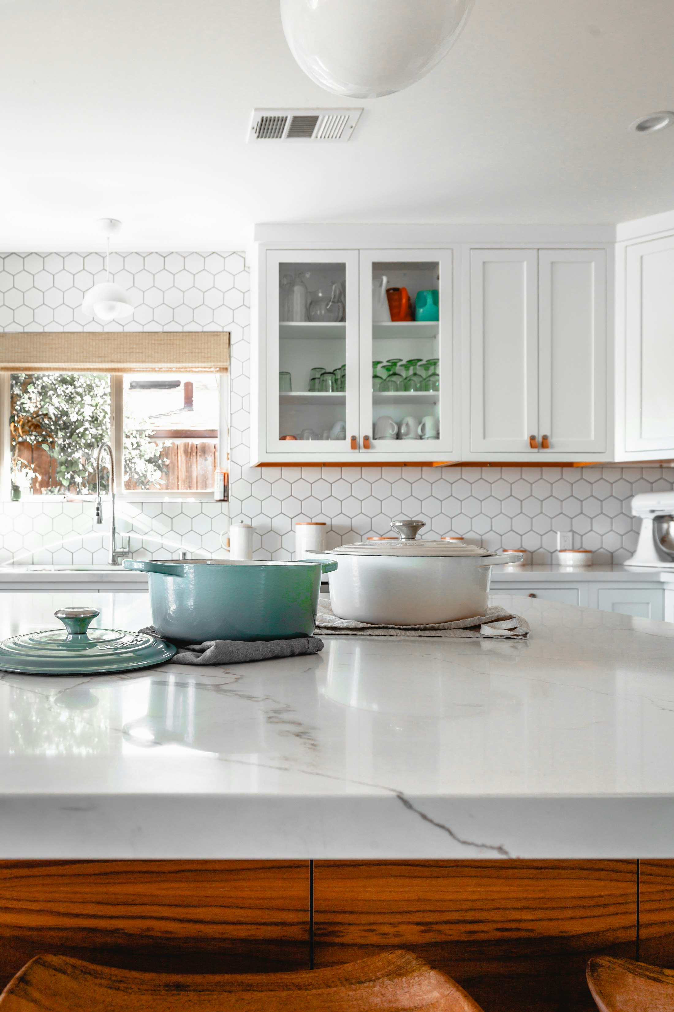 Bright, fully remodeled kitchen with custom cabinetry and stone countertops in Cape Coral, FL
